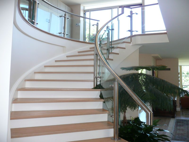 Glass railing with combination of stainless steel